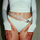 Ballet Bolero Set in cloud white featuring a matching shrug, tube top and thong. Also featuring a white glitter belt.