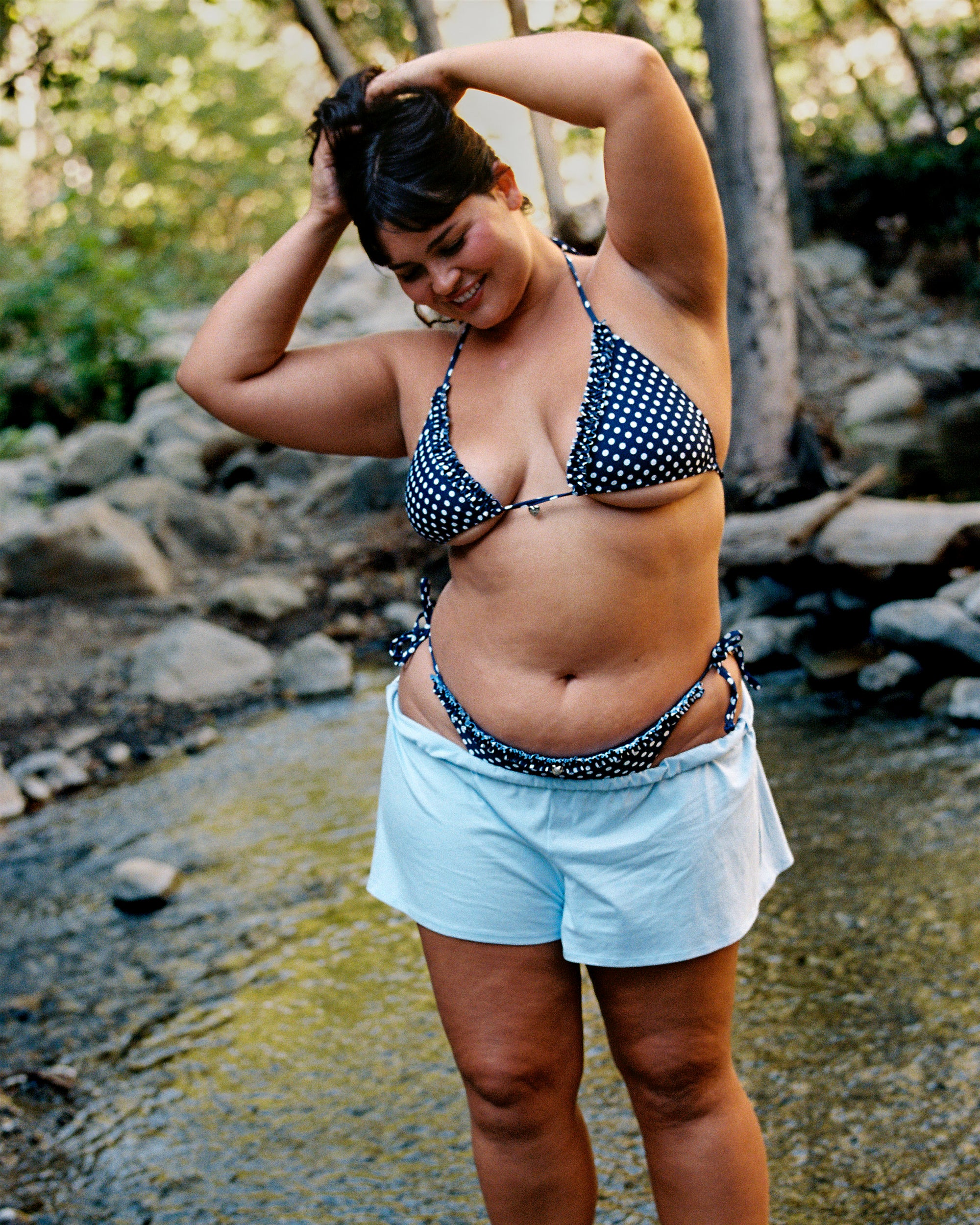 RUFFLE CHARM BIKINI TOP IN NAVY DOT